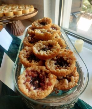 Cherry baby pies with crumble topping in glass tray for rustic garden weddings, parties, and showers across Central Florida, Orlando, St. Augustine, and Daytona.