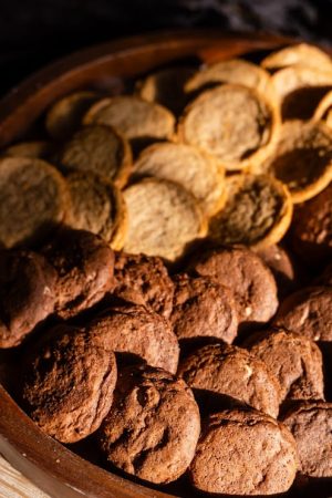 Chocolate and brown sugar cookies displayed on a rustic platter at a Central Florida wedding or corporate event in Orlando, Daytona, or St. Augustine.