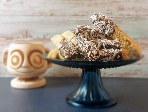 Chocolate biscotti with coconut flakes, ideal for dessert tables at weddings, showers, and parties in Central Florida.