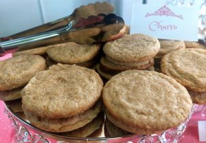 Cinnamon churro cookies on mirrored stand at D’Space Orlando sweet sixteen and quinceañera celebration.