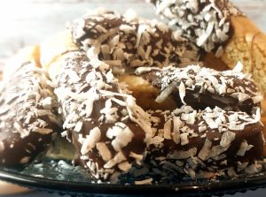 Close-up of chocolate-dipped coconut biscotti for Orlando weddings, baby showers, and corporate dessert tables.