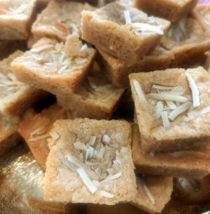 Coconut blondies with shredded coconut topping for weddings, garden parties, and tropical-themed events in Central Florida, Orlando, St. Augustine, and Daytona.