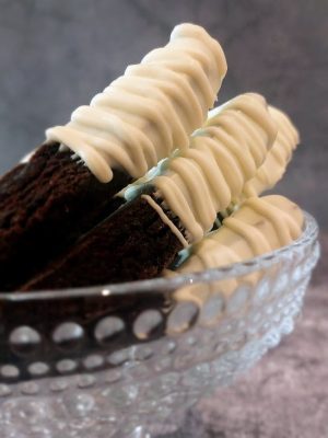 Dark chocolate biscotti dipped in white chocolate for weddings, showers, and events in Orlando and Central Florida.