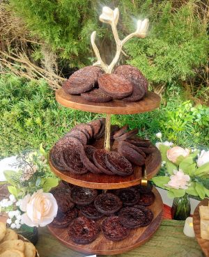 Flourless fudge cookies on tiered stand at Cypress Grove Estate wedding dessert table, gluten-free and dairy-free option.