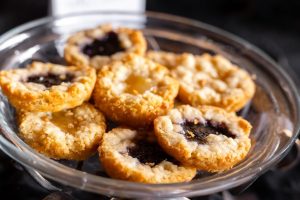 Assorted mini fruit pies on dessert table at New York Beer Project Orlando wedding or corporate event.