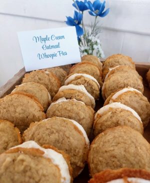 Oatmeal whoopie pies with maple cream filling served at a wedding dessert table in Venue 1902, Central Florida.