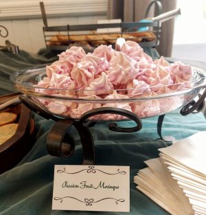 Passion fruit meringues in a glass dessert bowl with scroll base for weddings, showers, and parties in Central Florida, Orlando, St. Augustine, and Daytona with romantic and modern event themes.