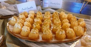 Peach mini bundt cakes with frosting and sprinkles, perfect for weddings at Legacy at Oak Meadows near Daytona.