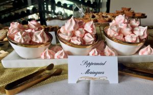 Peppermint meringues in gold-rimmed bowls for holiday dessert tables at weddings, corporate events, and Christmas parties in Central Florida, Orlando, St. Augustine, and Daytona.