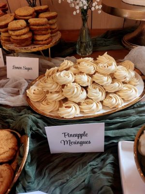 Golden pineapple meringues on a wedding dessert table for rustic and tropical-themed events in Central Florida, Orlando, St. Augustine, and Daytona.