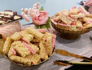 Rice Krispy treats with pink sprinkles for baby showers, bridal showers, and weddings in Daytona dessert tables.