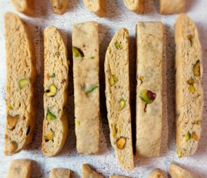Crunchy pistachio biscotti cookies, ideal for weddings, showers, and coffee bars in Central Florida.