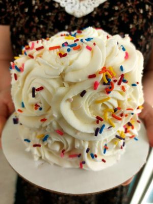 Mini rosette cake with colorful sprinkles, ideal for birthdays, holidays, and celebrations in Orlando and surrounding areas.