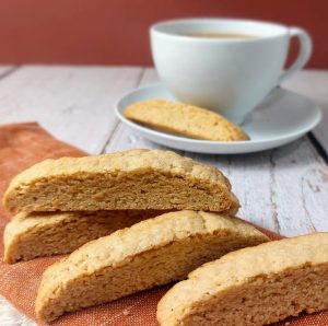 Traditional vanilla biscotti with coffee, perfect for weddings, showers, and brunch events in Orlando or Daytona.