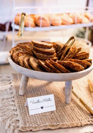 Vanilla Nutella cookies displayed on rustic wooden stand for Ever After Farms wedding in Central Florida.