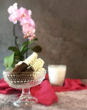 Dark chocolate biscotti dipped in white chocolate, perfect for weddings, baby showers, and corporate events in Florida.