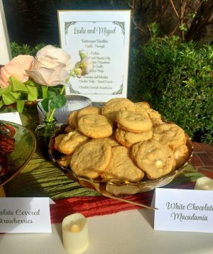 White chocolate macadamia cookies displayed on elegant tray at Orlando wedding dessert table at Cypress Grove Estate.