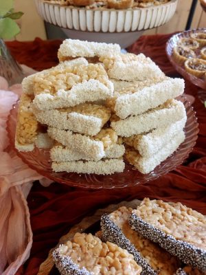 Rice Krispy treats with white sprinkles for Orlando weddings and shower dessert tables.